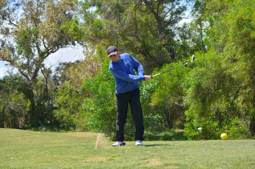Golfer learning how can seniors hit the golf ball further from the tee box